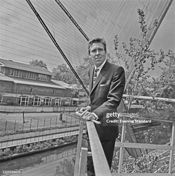 Antony Armstrong-Jones, 1st Earl of Snowdon in the Snowdon Aviary at London Zoo, London, UK, 27th May 1965. He designed the new structure in...