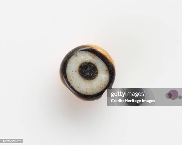 Eye-bead, with a lateral bore; the eyelet broken off, New Kingdom, 1550-1307 BCE. Artist Unknown.