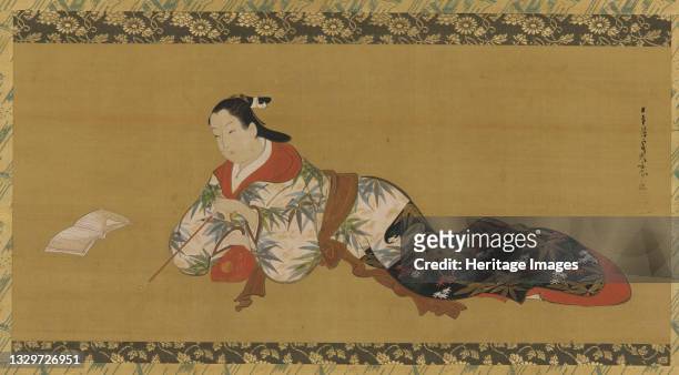 Yujo reclining and reading a musical score, Edo period, 1615-1868. Artist Unknown.