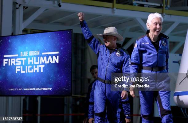 Blue Origin’s New Shepard crew Jeff Bezos and Wally Funk arrive for a press conference after flying into space in the Blue Origin New Shepard rocket...