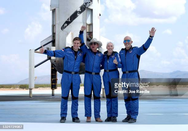Blue Origin’s New Shepard crew Oliver Daemen, Jeff Bezos, Wally Funk, and Mark Bezos pose for a picture after flying into space in the Blue Origin...