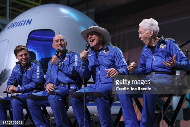 Blue Origin’s New Shepard crew Oliver Daemen, Mark Bezos, Jeff Bezos, and Wally Funk hold a press conference after flying into space in the Blue...