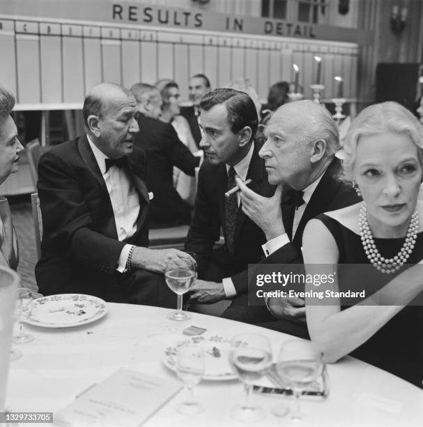 From left to right, English actor and director Noël Coward , American writer Gore Vidal and English fashion photographer and designer Cecil Beaton at...