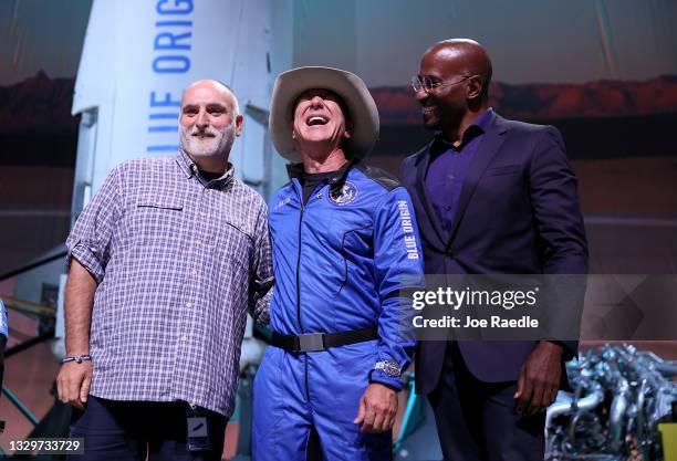 Jeff Bezos stands with Chef Jose Andres and Van Jones, founder of Dream Corps, after announcing a $100 million award for their projects that help...