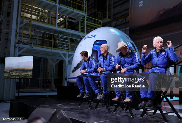 Blue Origin’s New Shepard crew Oliver Daemen, Mark Bezos, Jeff Bezos, and Wally Funk hold a press conference after flying into space in the Blue...