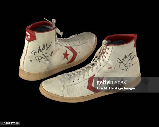 African-American sportsman Julius Winfield Erving II is regarded as one of the most influential basketball players of all time. Pair of white and red...