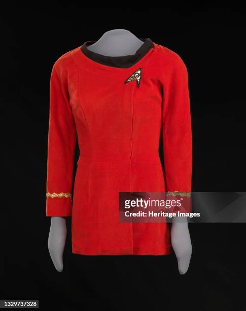 Starfleet uniform worn by African-American actor Nichelle Nichols as the character Lt. Uhura on the television show Star Trek. The kiss scene between...