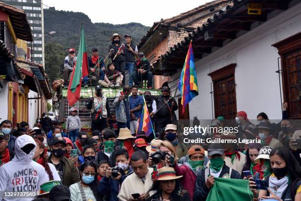 Indigenous members of the so-called Minga Indigena del Cauca prepare to participate in a protest against the government on July 20, 2021 in Bogota,...