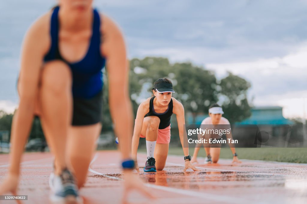 Asian Chinese Athletes Lining Up Starting Line Aerodynamic Shape