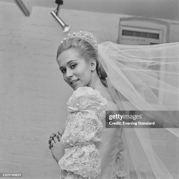 British socialite and artist Charmian Scott, later Charmian Campbell during her wedding to Scottish theatrical producer Archie Stirling, UK, 11th...