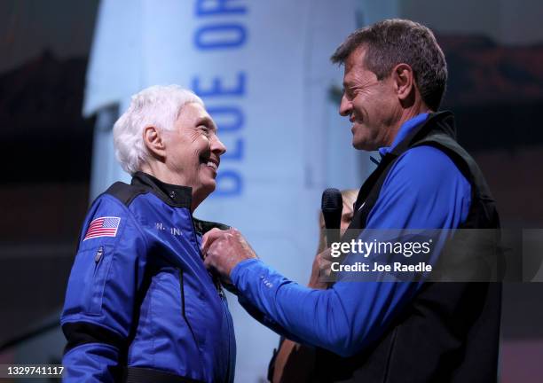 Wally Funk receives astronaut wings from Blue Origin’s Jeff Ashby, a former Space Shuttle commander, after her flight on Blue Origin’s New Shepard...