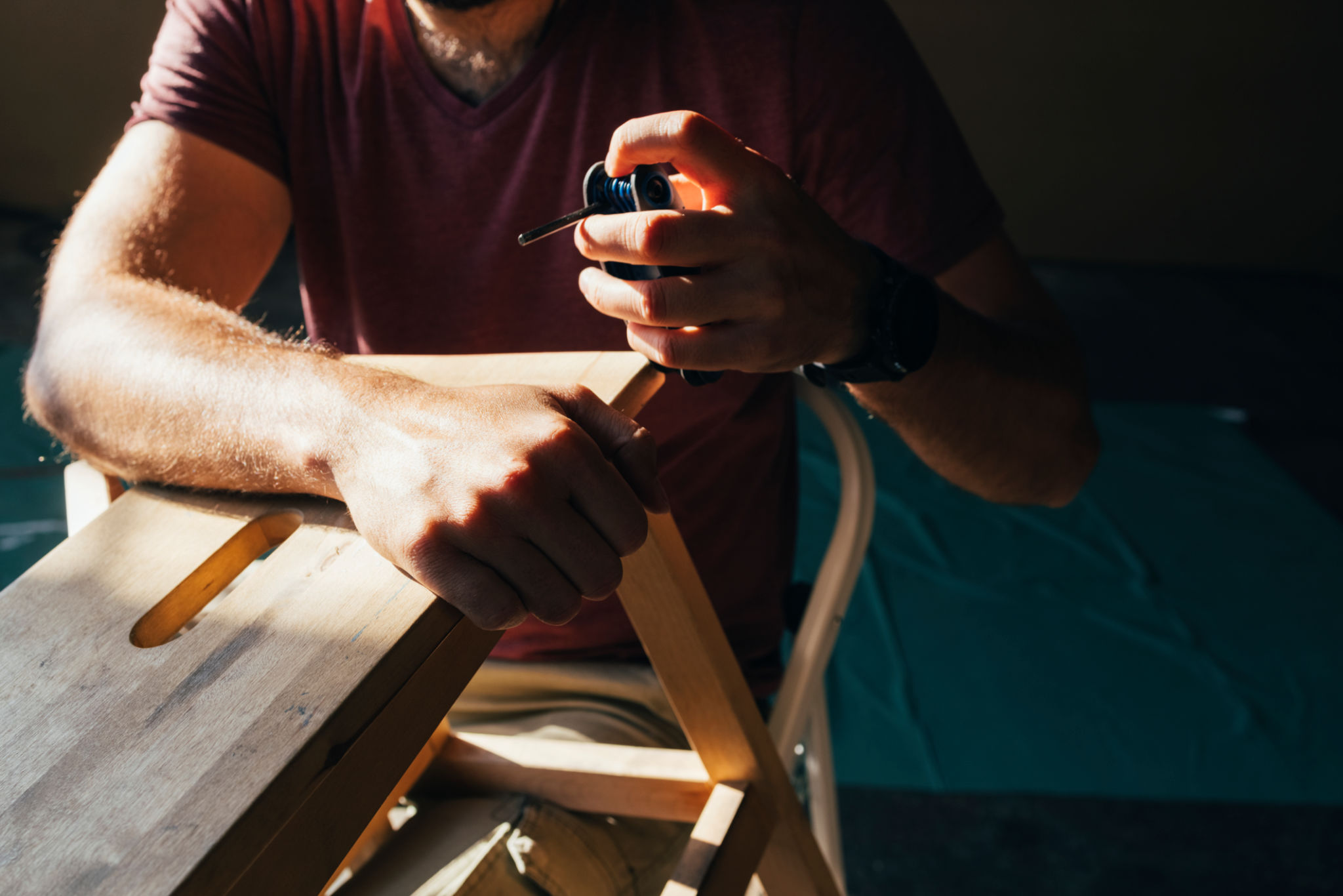 craftsman repairing furniture