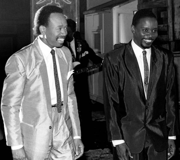 American singer, musician, songwriter, and record producer Maurice White and American R&B, soul, gospel and funk singer, songwriter and percussionist...
