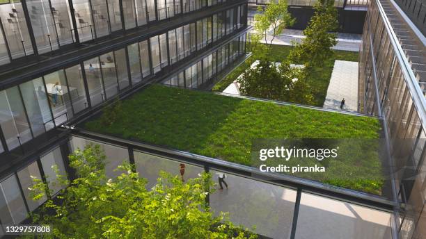 edificio verde - jardín urbano fotografías e imágenes de stock