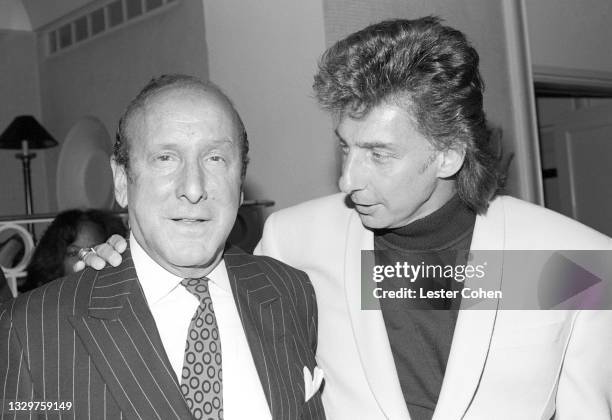 American record producer, A&R executive, music industry executive, and lawyer Clive Davis poses for a portrait with American singer-songwriter,...