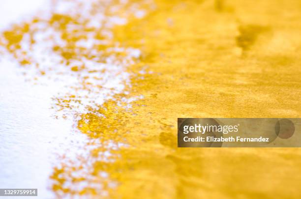 abstract smear of gold lipstick, backgrounds - beauty cosmetic luxury studio background stock pictures, royalty-free photos & images