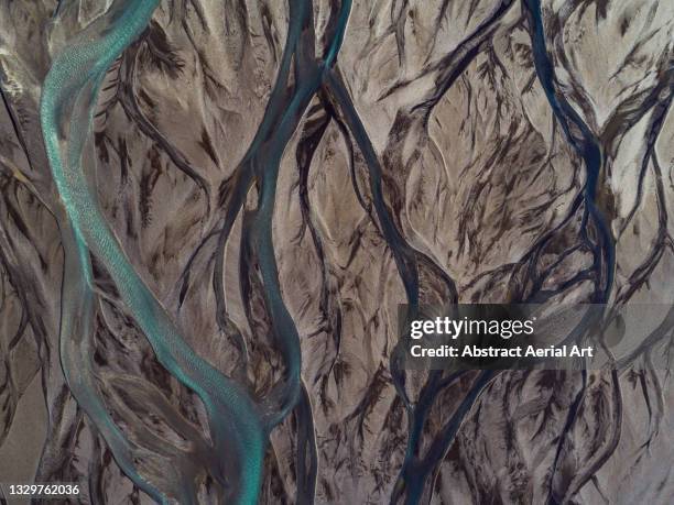 braided river photographed form a birds-eye perspective by drone, iceland - braided river stock pictures, royalty-free photos & images