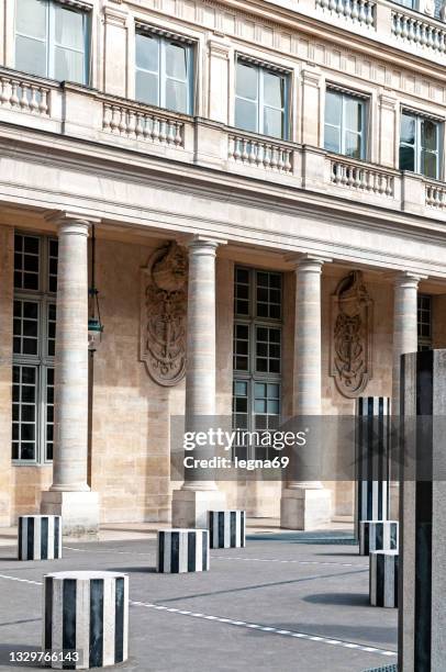buren columns in palais royal - palais royal stock pictures, royalty-free photos & images