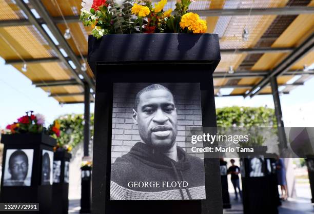 Photograph of George Floyd is displayed along with other photographs at the Say Their Names memorial exhibit at Martin Luther King Jr. Promenade on...