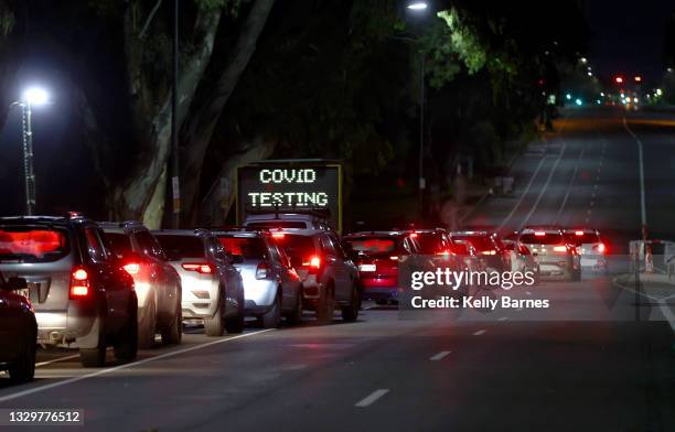 People lined up overnight to access the Covid-19 testing site at Victoria park on July 21, 2021 in Adelaide, Australia. South Australia is in...