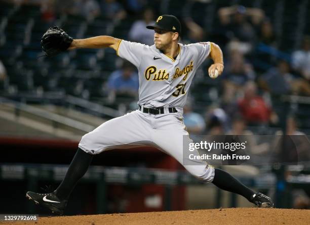 Starting pitcher Tyler Anderson of the Pittsburgh Pirates throws against the Arizona Diamondbacks during the second inning of the MLB game at Chase...