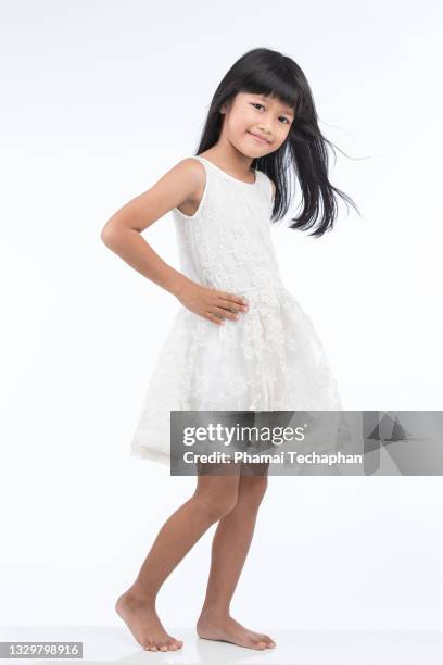 happy girl smiling - girls dress stock pictures, royalty-free photos & images