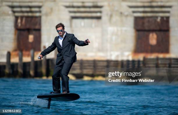 Pro Athlete Tom Court commutes in style across the Solent on a Fliteboard - the watercraft of the future, on July 20, 2021 in Yarmouth, England.