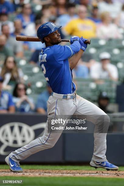 Michael A. Taylor of the Kansas City Royals hits a sacrifice fly against the Kansas City Royals at American Family Field on July 20, 2021 in...