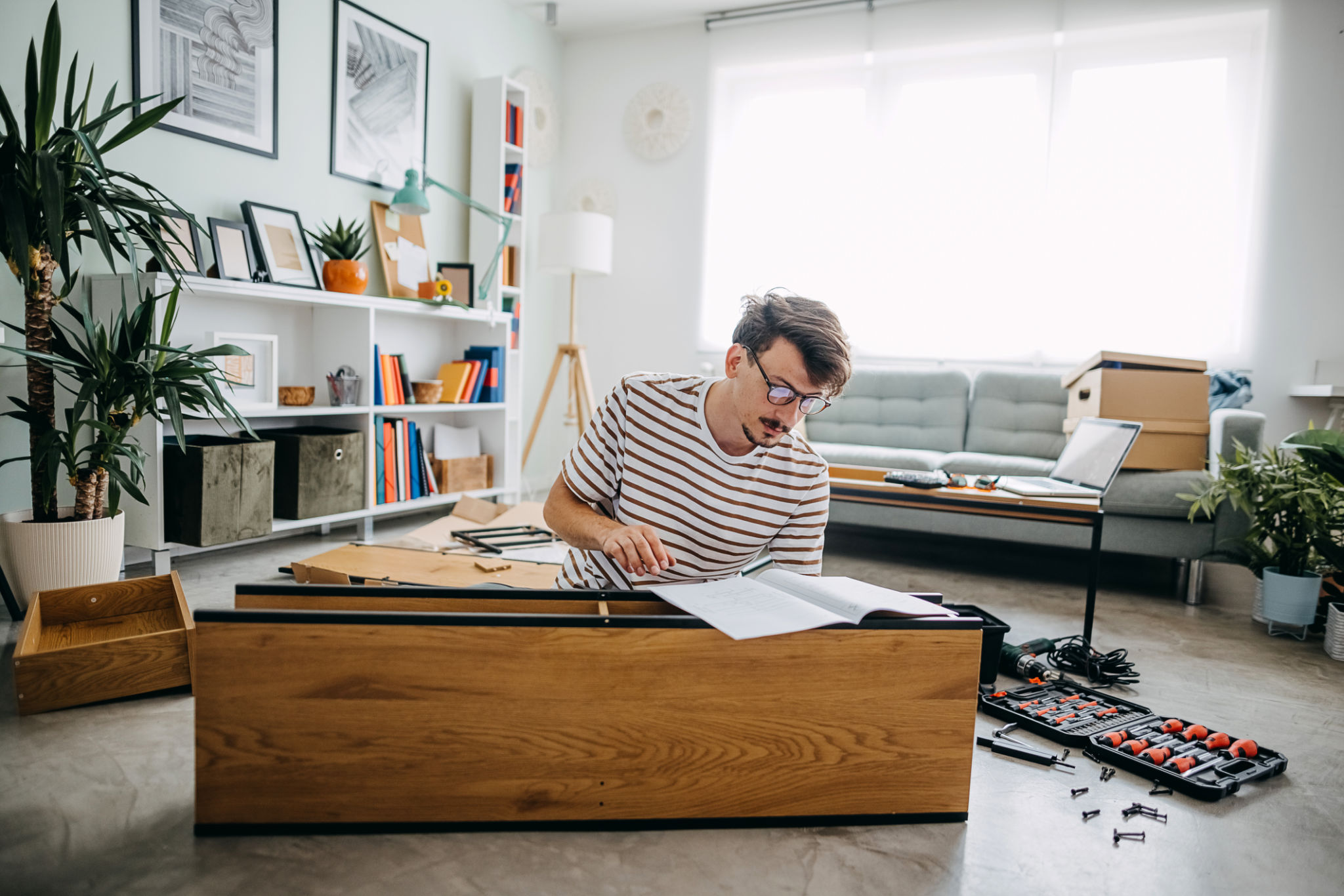 person assembling desk