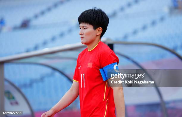 Shanshan Wang of Team China leads the team on to the pitch prior to the Women's First Round Group F match between China and Brazil during the Tokyo...
