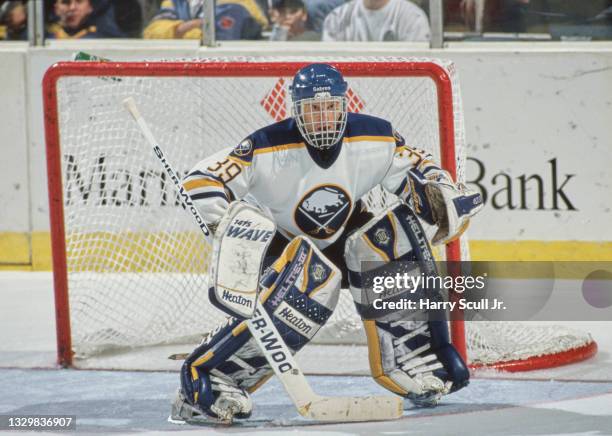 Dominik Hasek, Goaltender for the Buffalo Sabres looks on from in front of the goal post during the NHL Eastern Conference Northeast Division game...