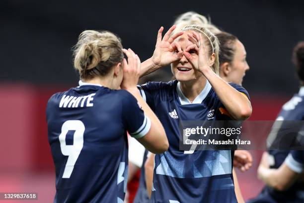 Ellen White of Team Great Britain celebrates with teammate Steph Houghton after scoring their side's second goal during the Women's First Round Group...