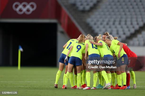 Players of Team Sweden form a huddle prior to the Women's First Round Group G match between Sweden and United States during the Tokyo 2020 Olympic...