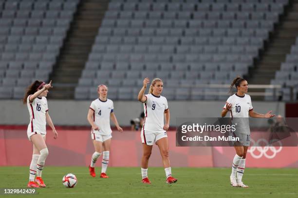 Rose Lavelle, Lindsey Horan and Carli Lloyd of Team United States look dejected after conceding a second goal scored by Stina Blackstenius of Team...
