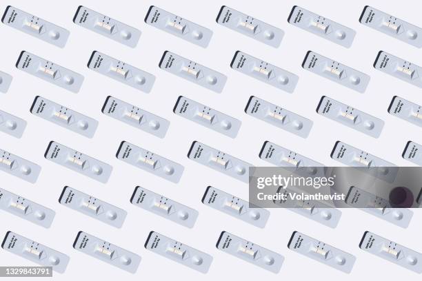 covid-19 rapid antigen tests on a white background - versuch stock-fotos und bilder