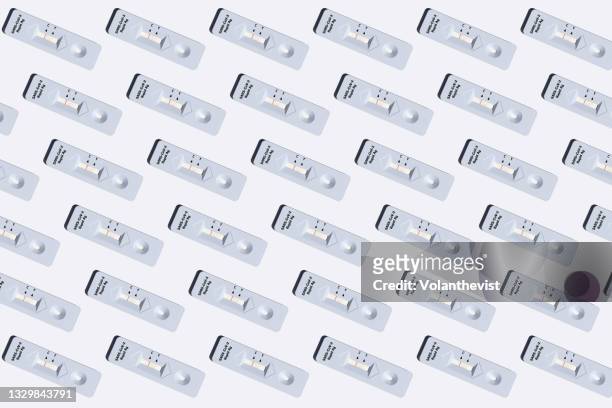 covid-19 rapid antigen tests on a white background - coronavirus test stock pictures, royalty-free photos & images