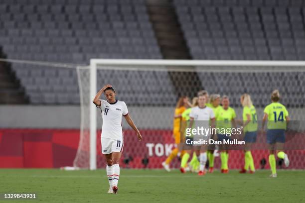 Christen Press of Team United States looks dejected after their side concede a third goal scored by Lina Hurtig of Team Sweden during the Women's...