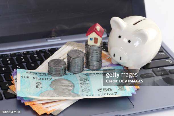 piggy bank and indian currency-concept of wealth creation - sweet little models stock pictures, royalty-free photos & images