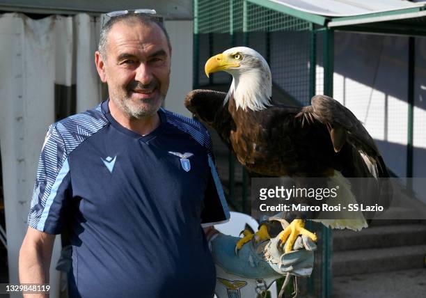 Lazio head coach Maurizio Sarri with the eagle Olimpia during the SS Lazio training session on July 21, 2021 in Auronzo di Cadore, Italy.