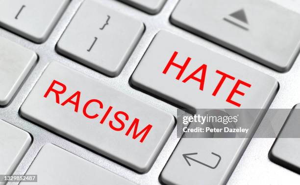 racism and hate online, trolling - racismo imagens e fotografias de stock