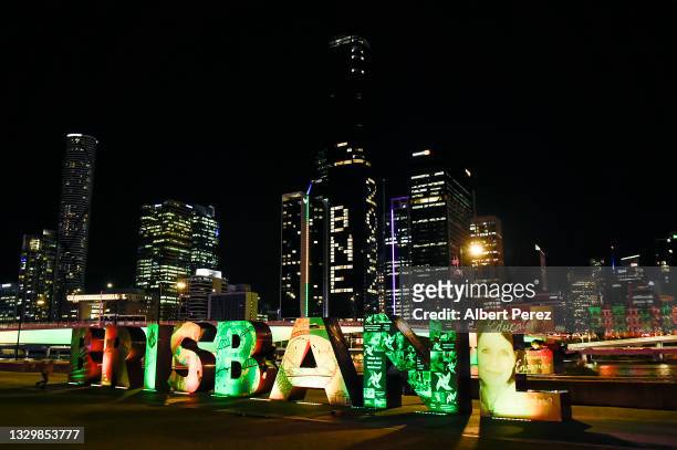 General view is seen as "BNE 2032" is displayed on a building during the announcement of the host city for the 2032 Olympic Games, watched via live...