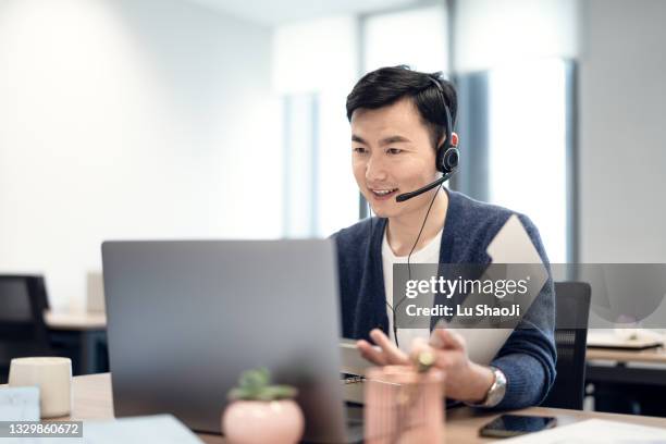 business people negotiate business through video conference - telemarketing stock pictures, royalty-free photos & images