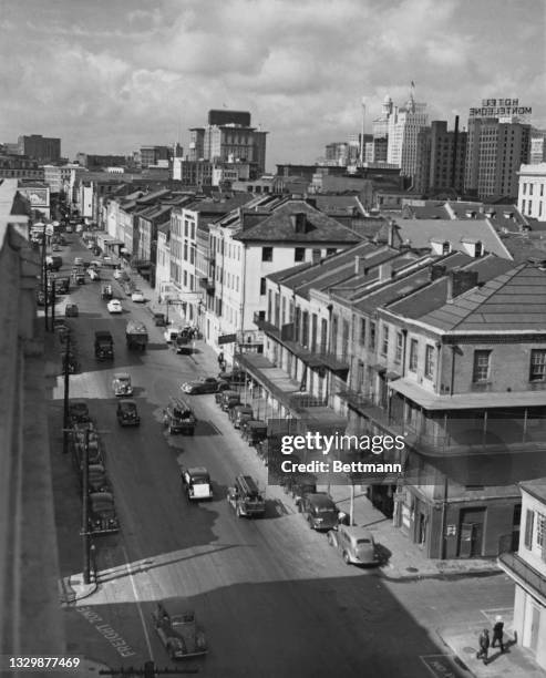View of Decatur Street in the French Quarter neighborhood of New Orleans, Louisiana, USA, circa 1937.