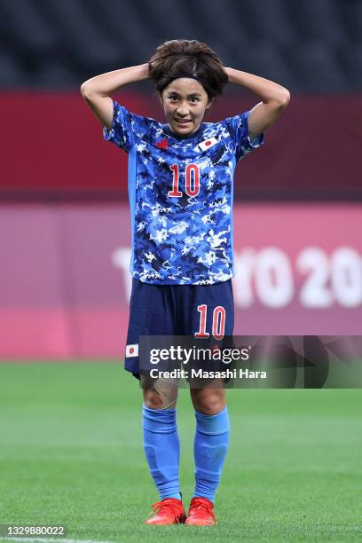 Mana Iwabuchi of Team Japan reacts during the Women's First Round Group E match between Japan and Canada during the Tokyo 2020 Olympic Games at...