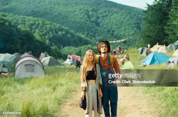 portrait of hippie couple on music fetival - archival camping stock pictures, royalty-free photos & images