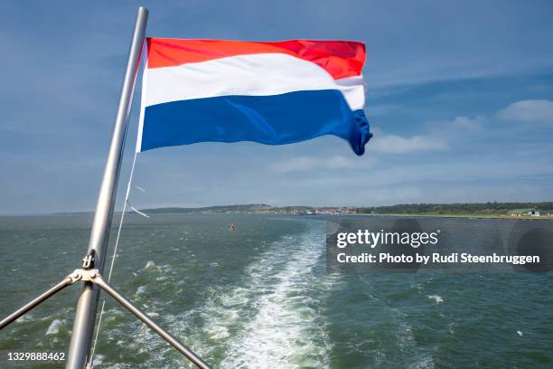 vlieland - nederlandse vlag stockfoto's en -beelden