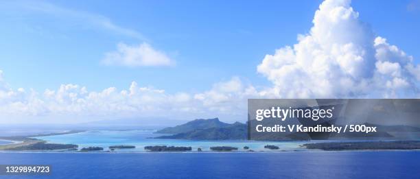 panoramic view of sea against sky,french polynesia - list of islands by highest point stock pictures, royalty-free photos & images