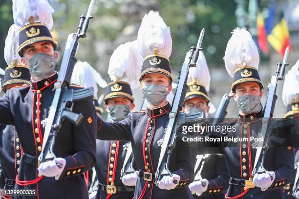 Princess Elisabeth of Belgium marches in the military parade of the Royal Military School during the ceremony in front of the Royal Palace on the...