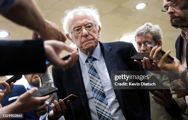 Sen. Bernie Sanders talks to reporters as he walks to a vote at the U.S. Capitol on July 21, 2021 in Washington, DC. The Senate is expected to hold a...