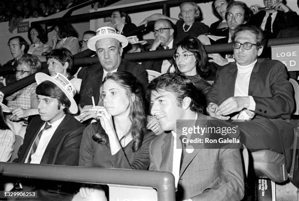Married actors Anne Byrne and Dustin Hoffman attend a political rally for Eugene McCarthy at Madison Square Garden, New York, New York, May 19, 1968.